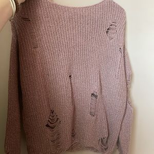 divided ripped sweater
